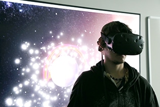 student using vr goggles