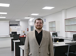 Teacher smiling at the camera