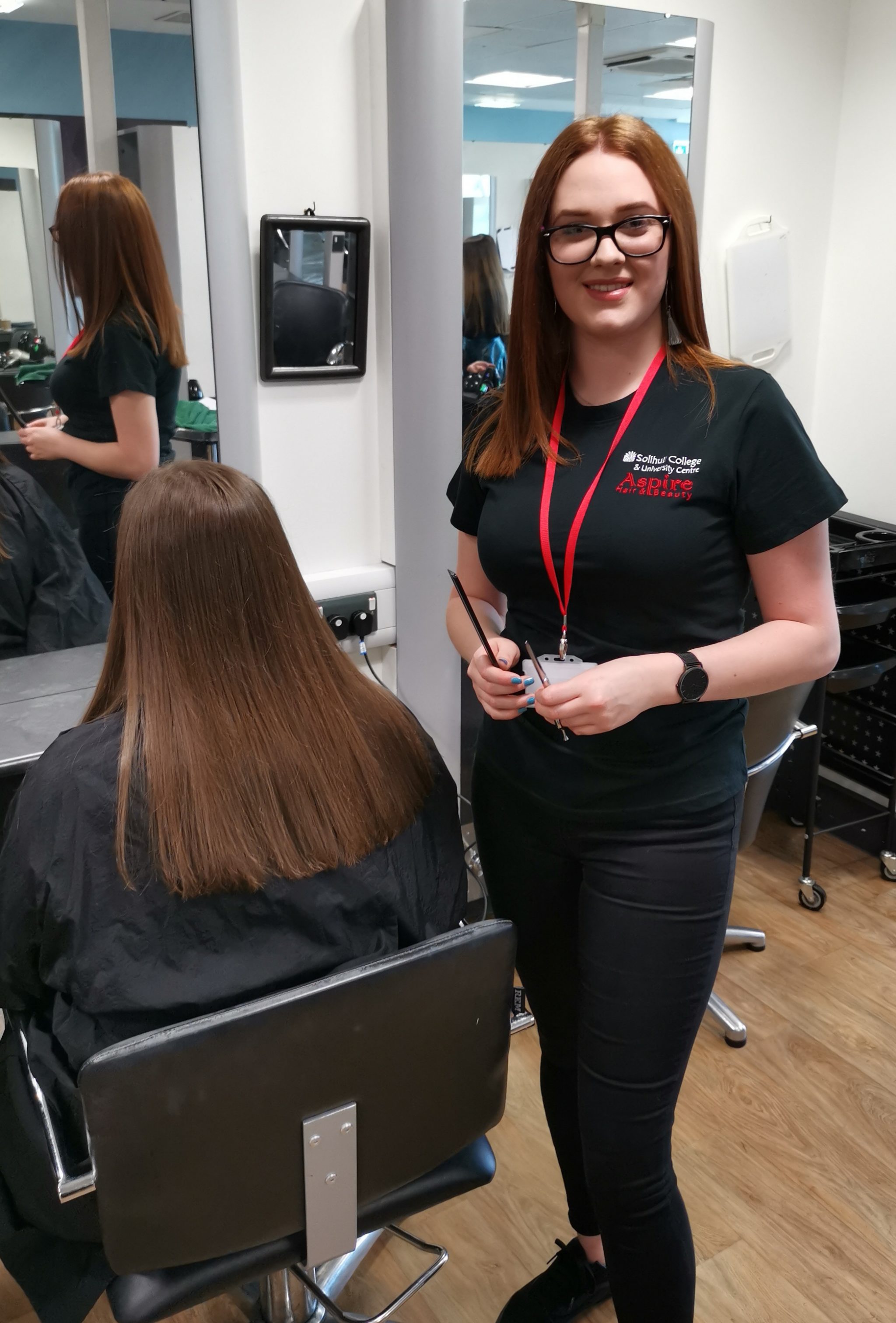Cliodhna stands in salon