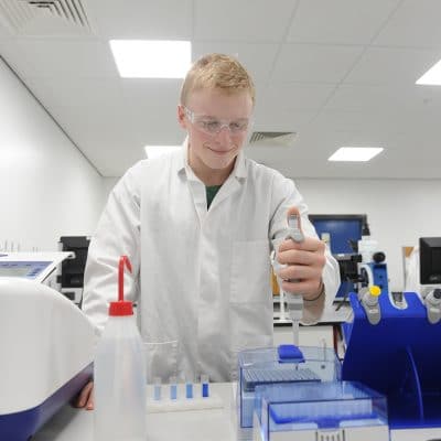scientist clicking something in lab