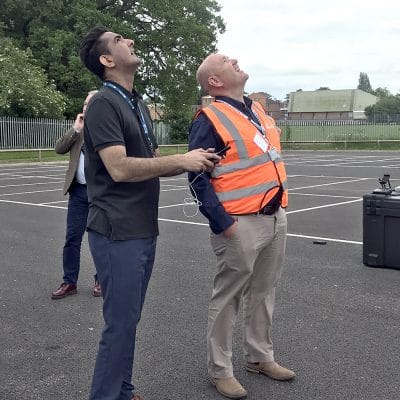 man operating drone
