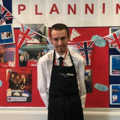 Adam King stood before board