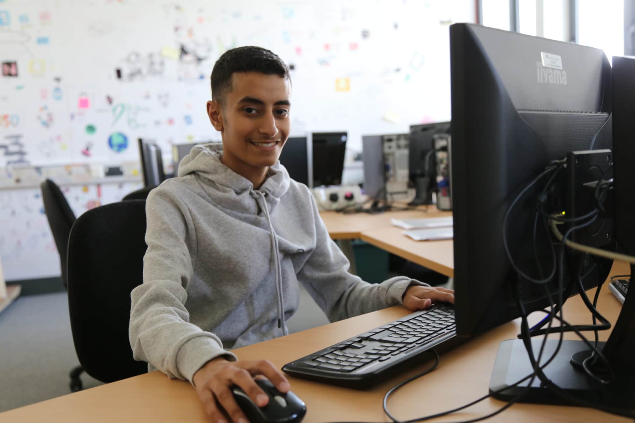 boy using computer
