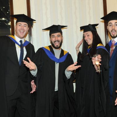 Students celebrating at graduation