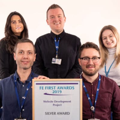 Stratford Team Photo with award