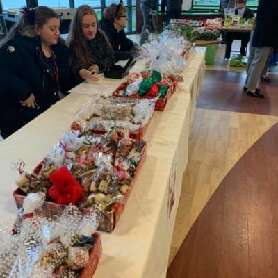 students selling dog treats