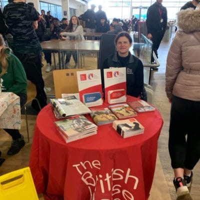 woman sat at employer table