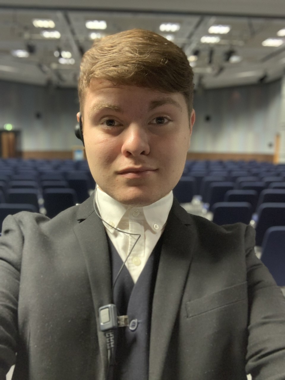 Joshua Charnley at the event in a suit