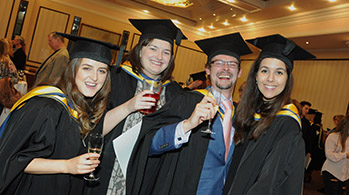 Students celebrating graduation