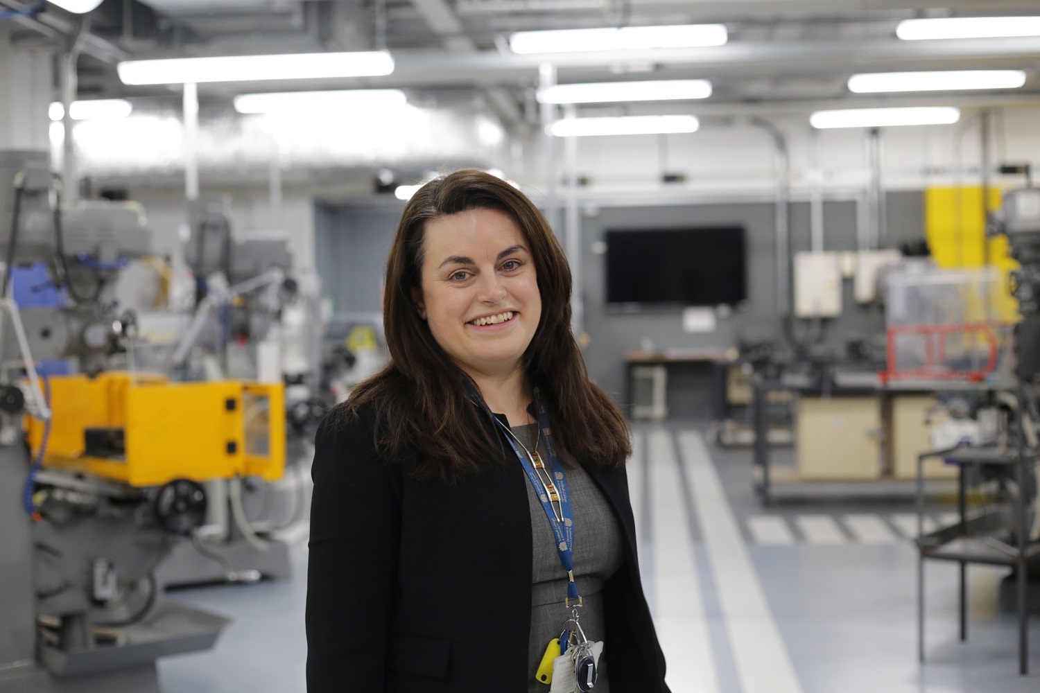 Rosa stands in the new engineering workshop