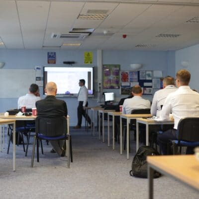 Alan delivers unit 1 to the class full of attendees at solihull college