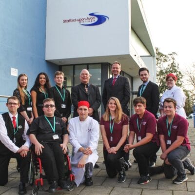 John and students outside Stratford College