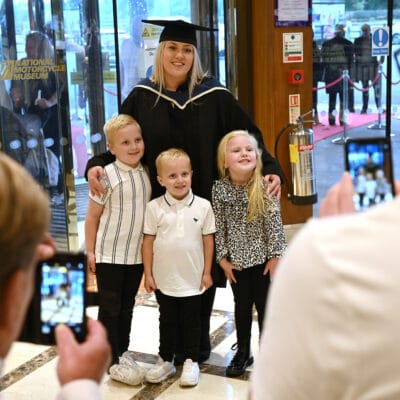 Graduate with her children