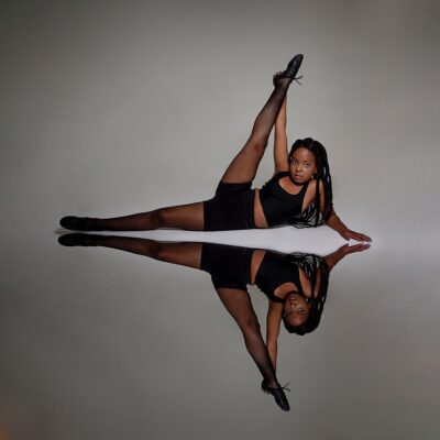 Student with leg in air