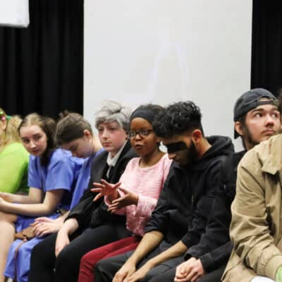 Group of students sat talking
