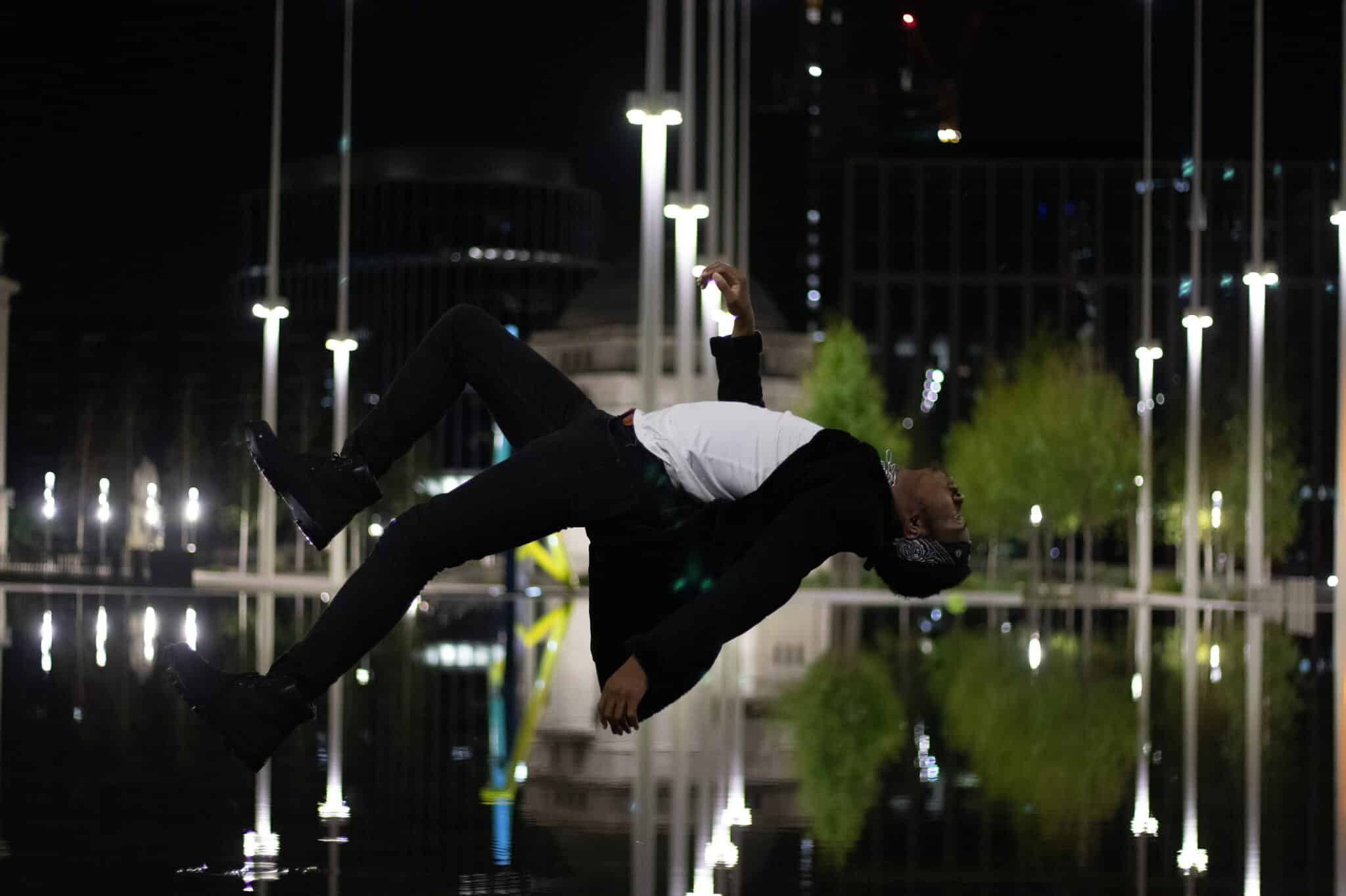 Man walking on water sideways