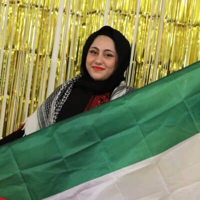 Student holding flag
