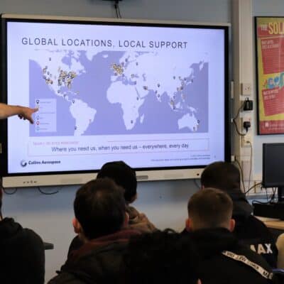 Student sin lecture - teacher pointing at map