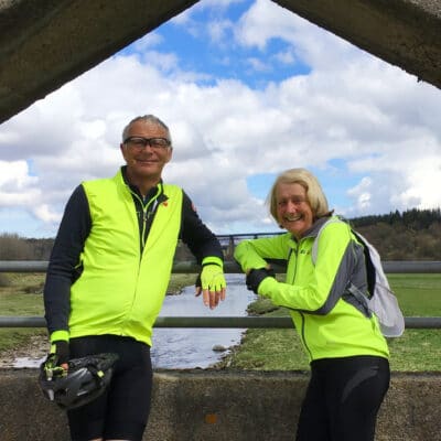 Tony and Linda standing in high vis jackets