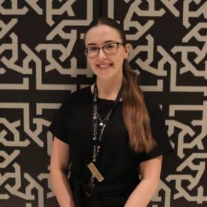 Sian Evans wearing black uniform at Santai Spa