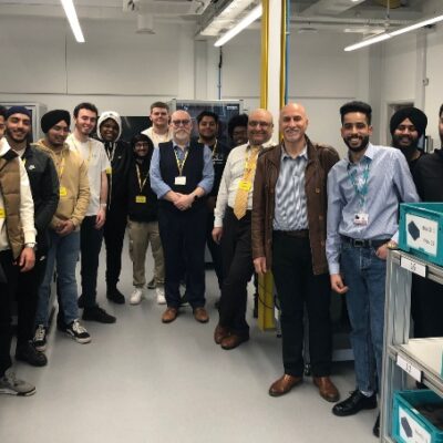 large group of staff and students standing