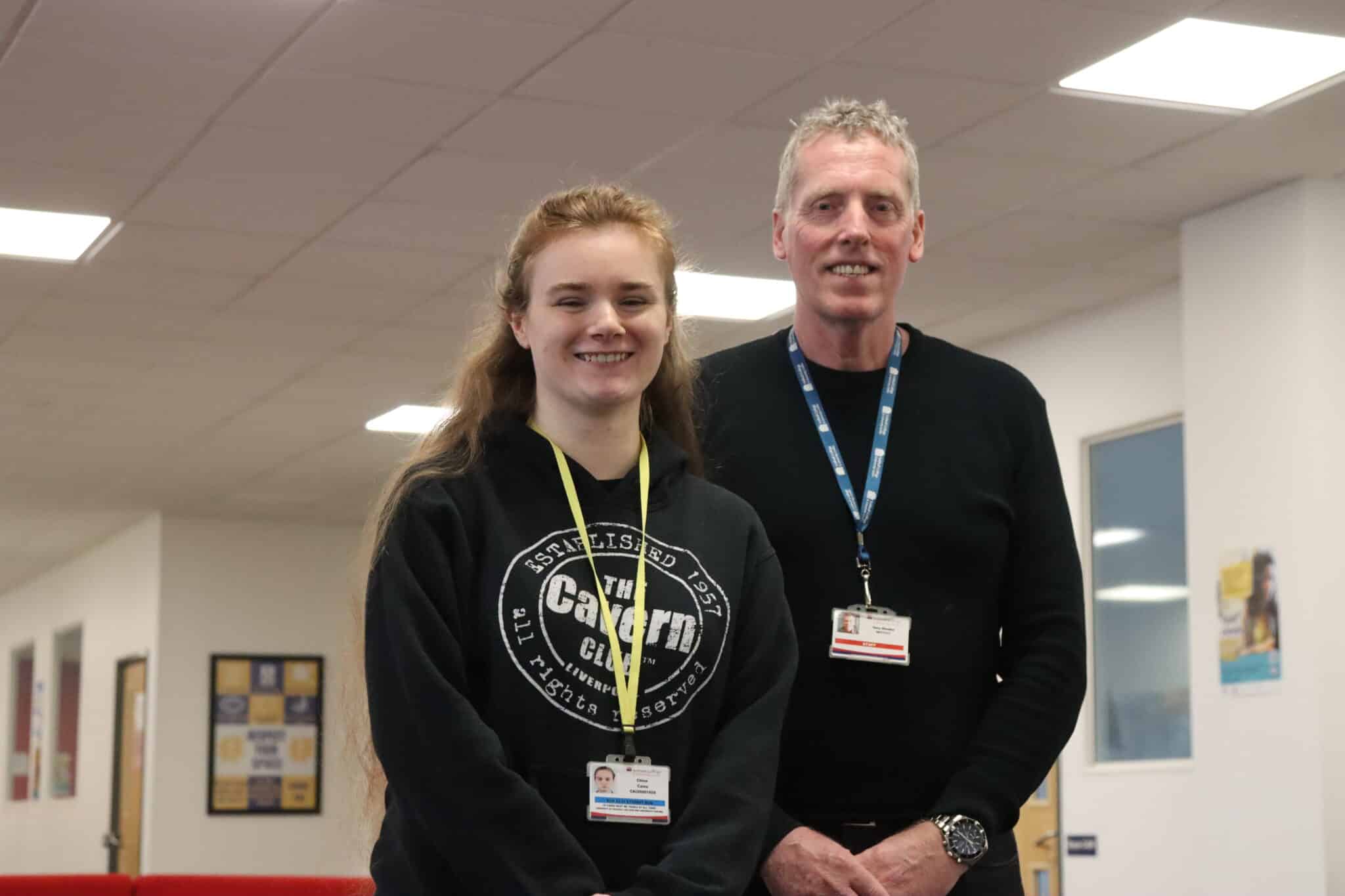 student and staff member stood next to each other