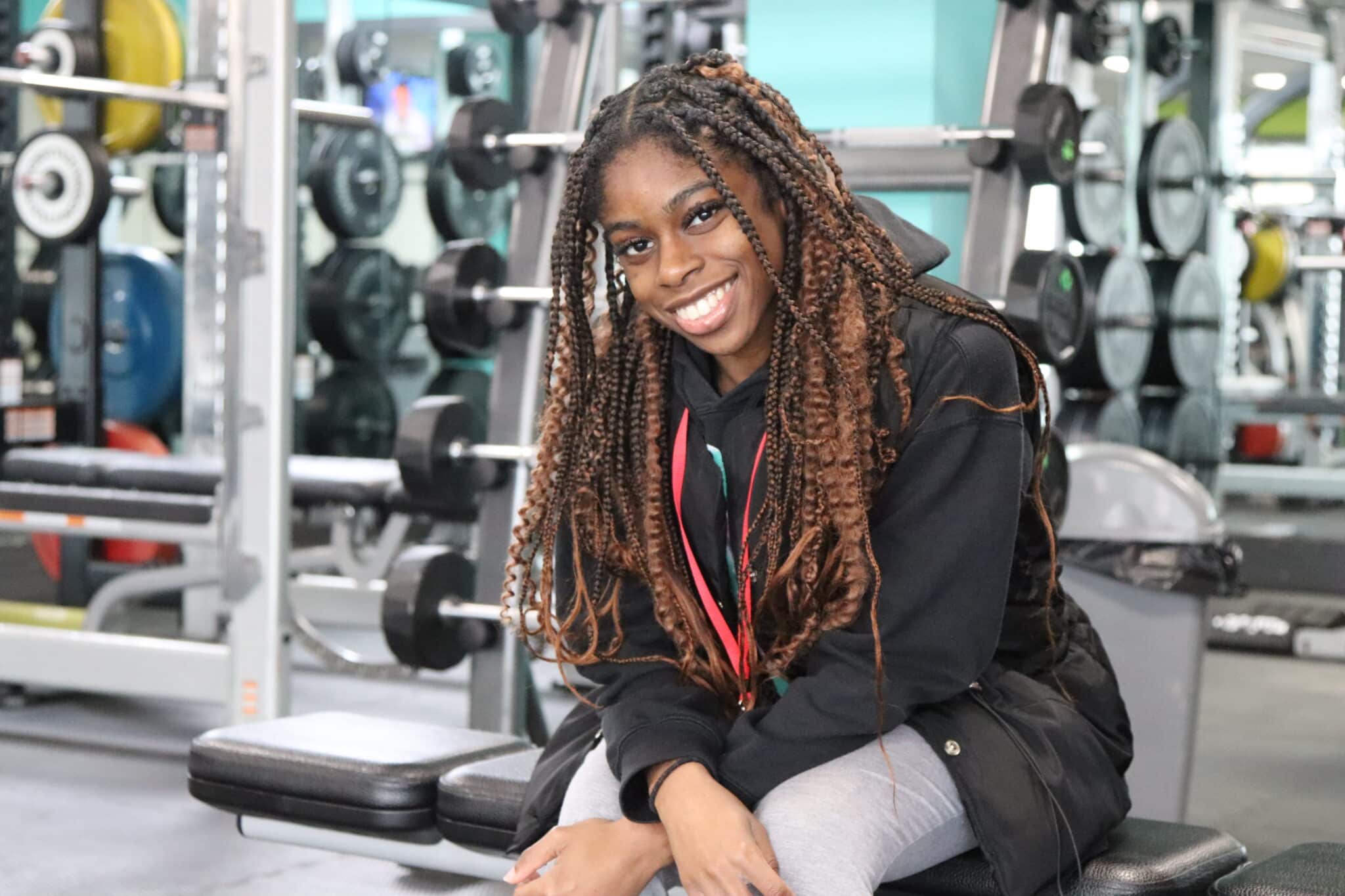 student looking at camera smiling