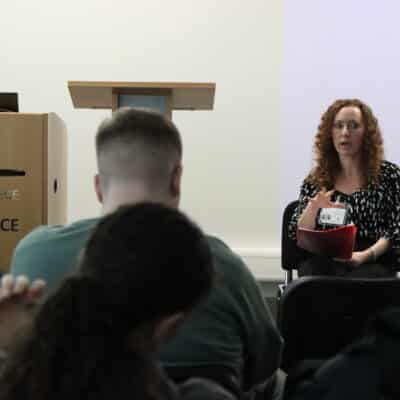 Dr Sharna Lewis talking to students