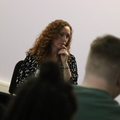 Dr Sharna Lewis talking to students