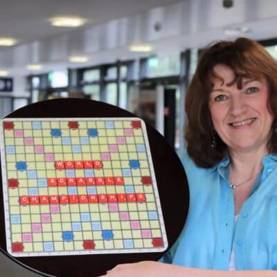 Natalie holding her scrabble board
