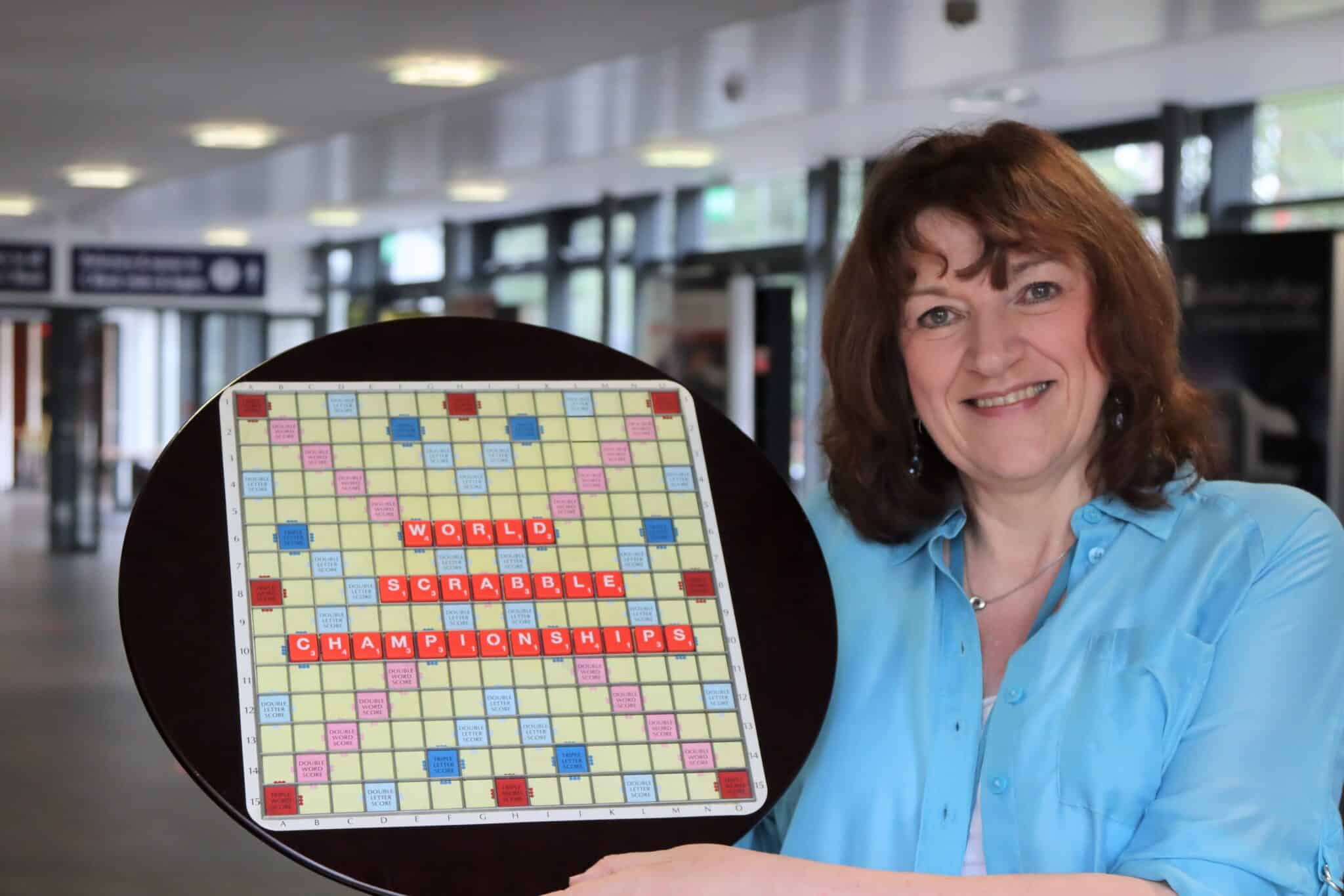 Natalie holding her scrabble board