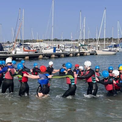 Students in the water demonstrating skills