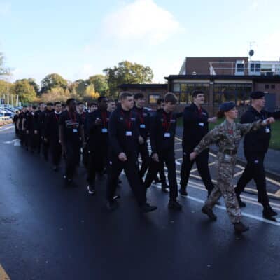 students marching on the annual Remembrance Day parade