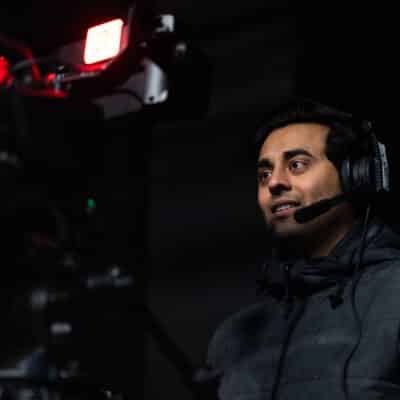 student behind the camera