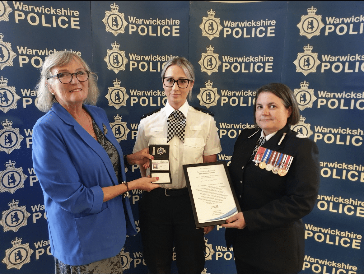 Heather receiving her warrant card