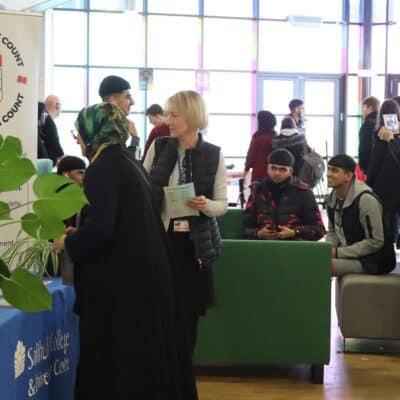 group of students in the college's common area