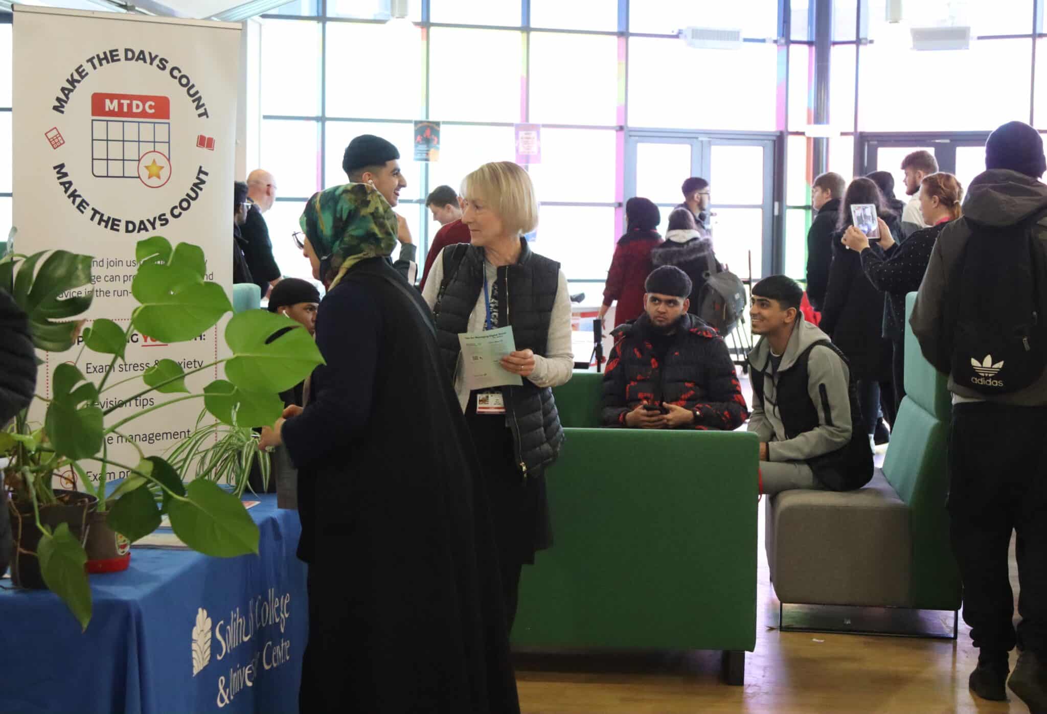 group of students in the college's common area