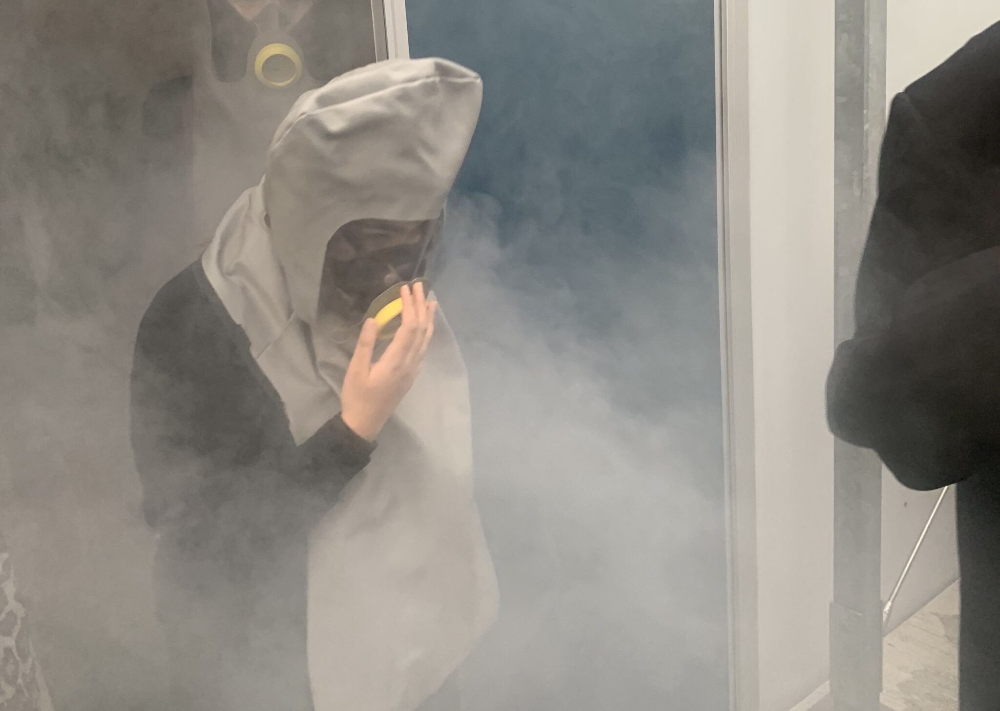 student in smoke filled cabin