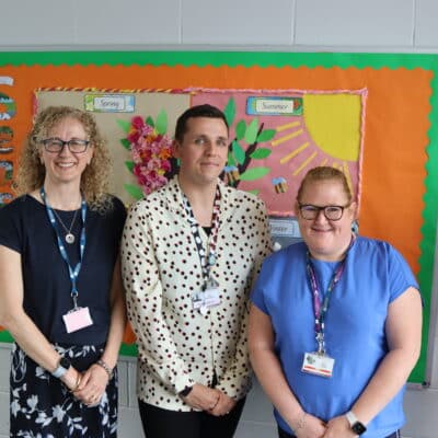 three people standing with arms crossed at front: Alison Gale - Education & Childcare Lecturer, Cam Bagley, Lucy Upton - Education & Childcare Coordinator