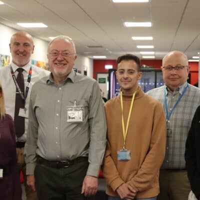 Solihull College people standing in a group: three staff and three students