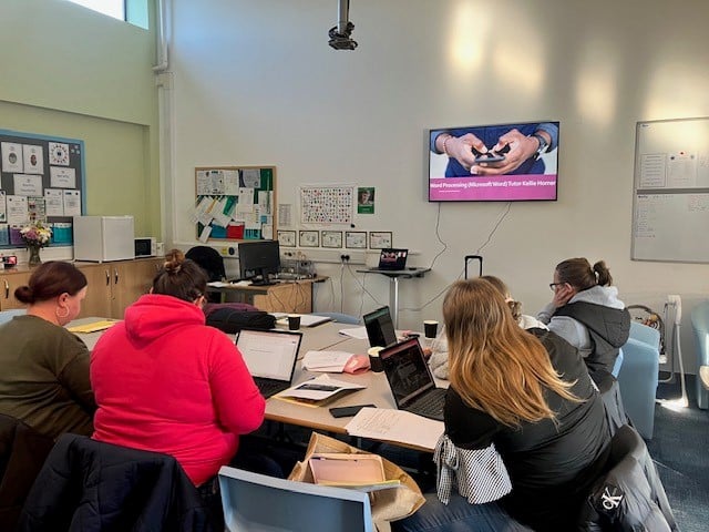 students in the mobile classroom studying digital skills