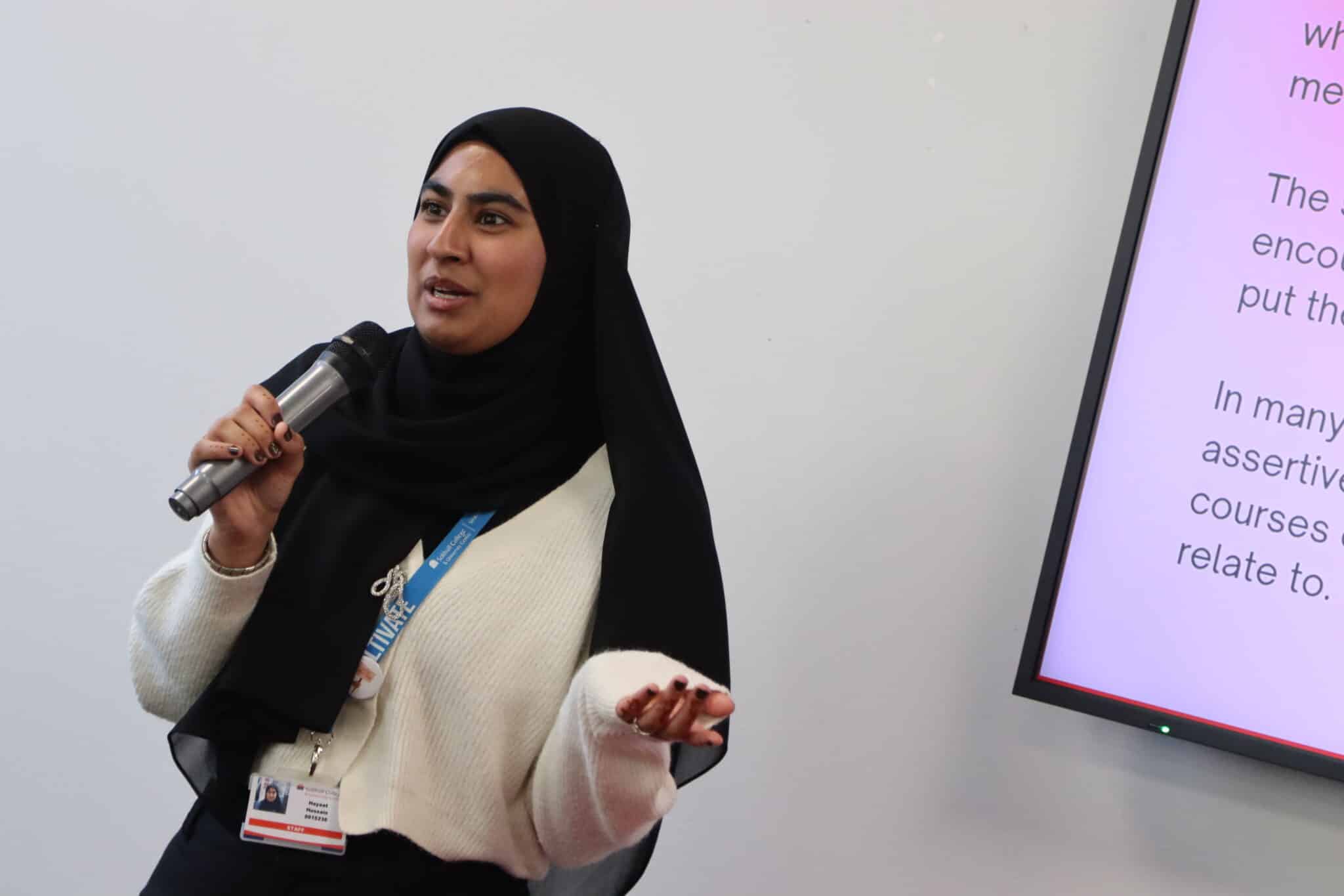 Student speaking in microphone