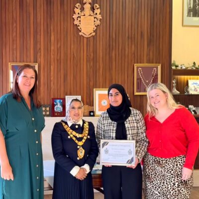 student voice president, Hayaat, with Mayor and team