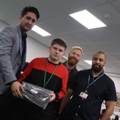 winning student with solihull college staff
