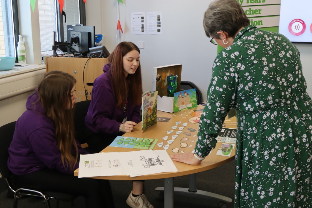 childcare students talking through their submissions