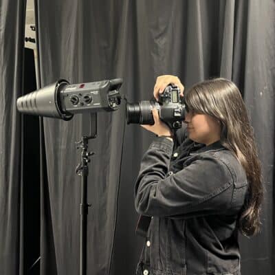 Ameena taking a picture of someone