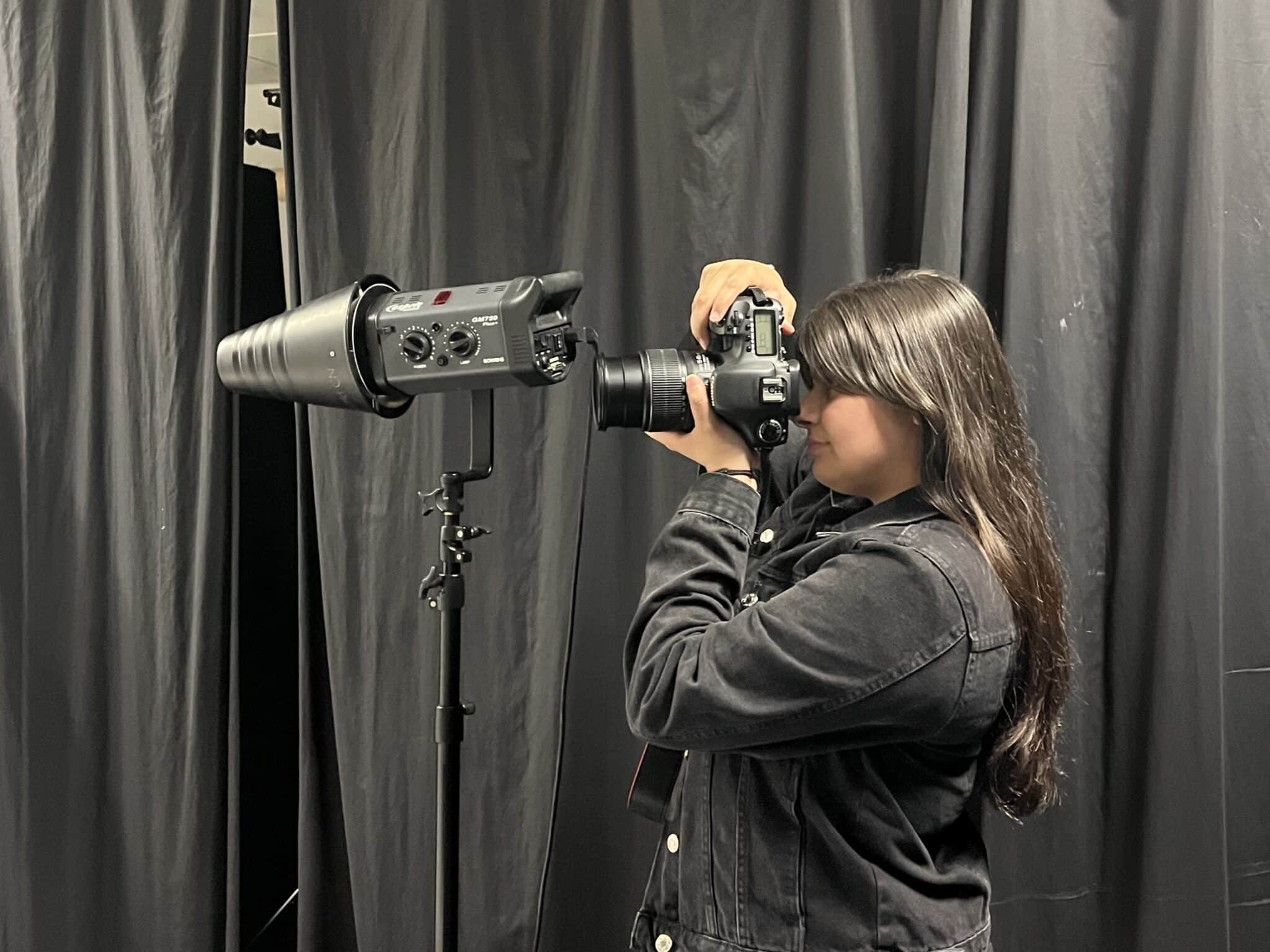 Ameena taking a picture of someone