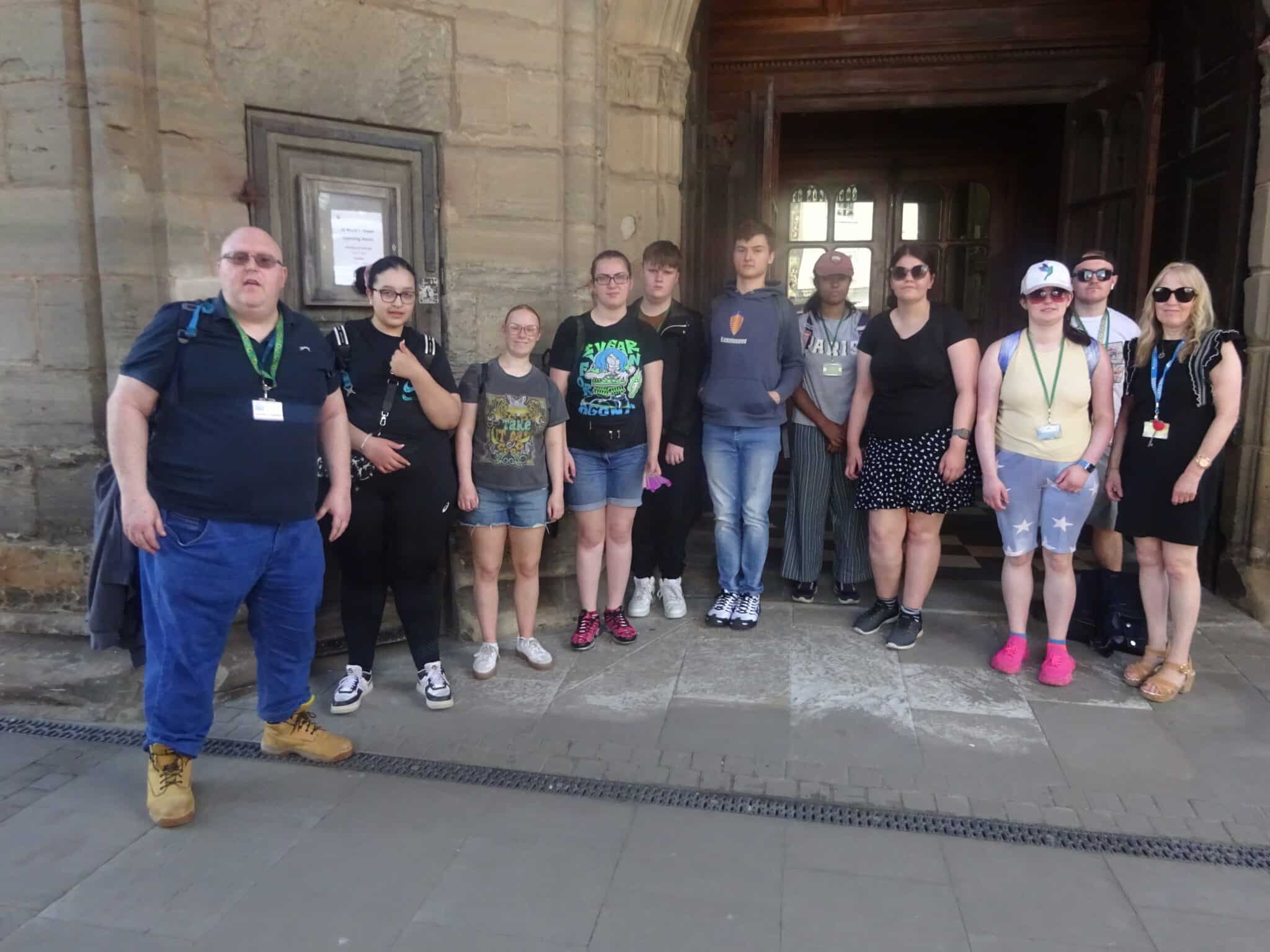 students and teachers standing in a group