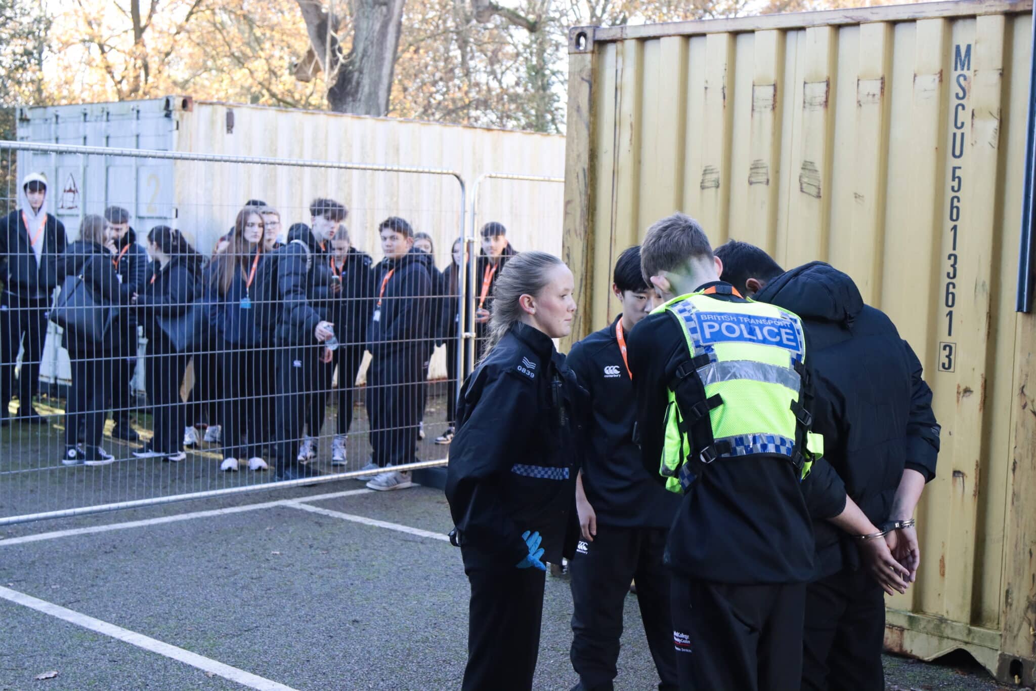 mock arrest involving 4 students, two in police officer vests