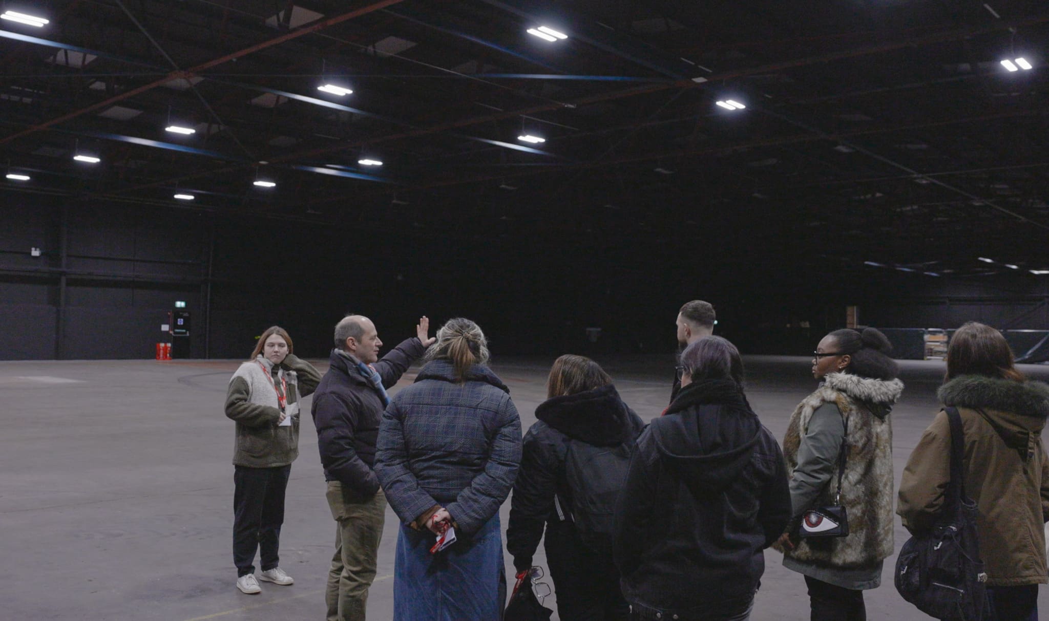Bootcamp students being shown round what will be the Peaky Blinders set in Digbeth Loc studios